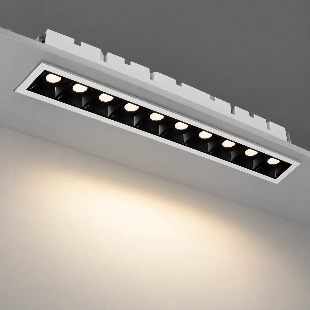 ten cell linear recessed downlight ceiling section